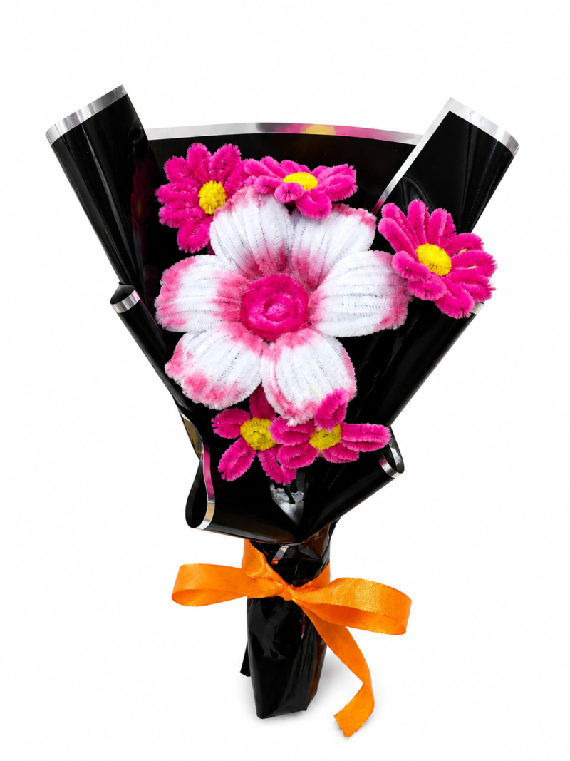 Handmade pipe cleaner flower bouquet with pink and white large flower and small pink blossoms, wrapped in black paper with orange ribbon